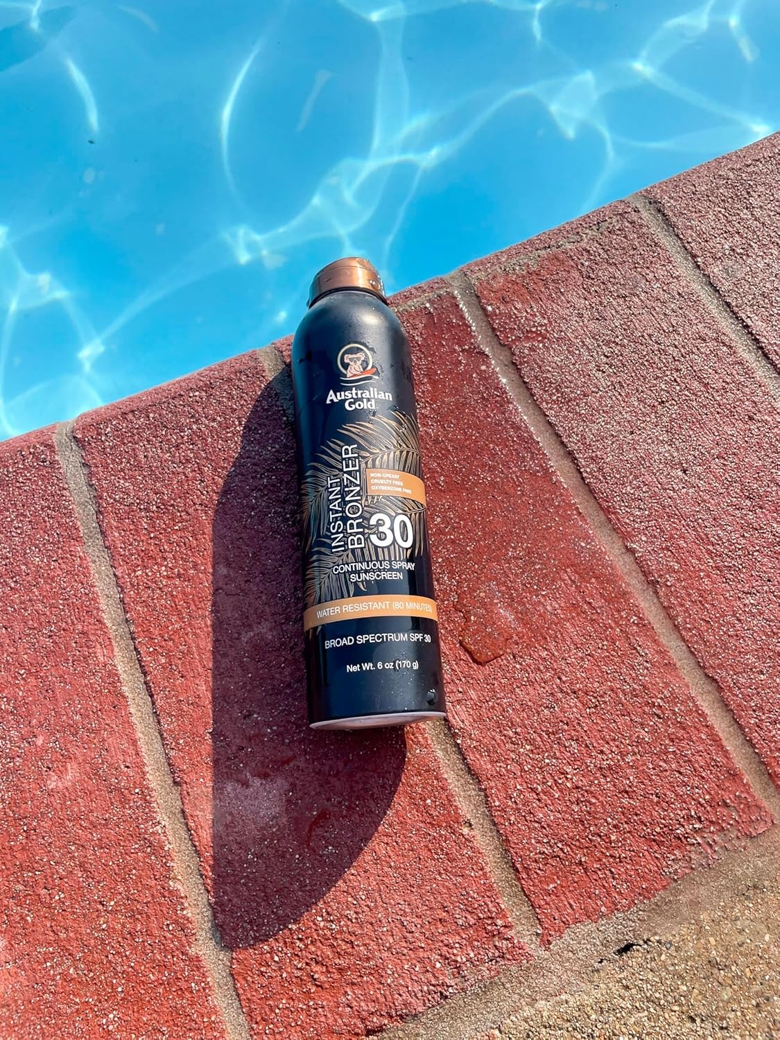 image:imageAustralian Gold Continuous Spray Sunscreen with Instant Bronzer SPF 30 Immediate Glow amp Dries Fast Water Resistant NonGreasy Oxybenzone Free Cruelty Free Bronzer New Orange 6 OzSPF 30